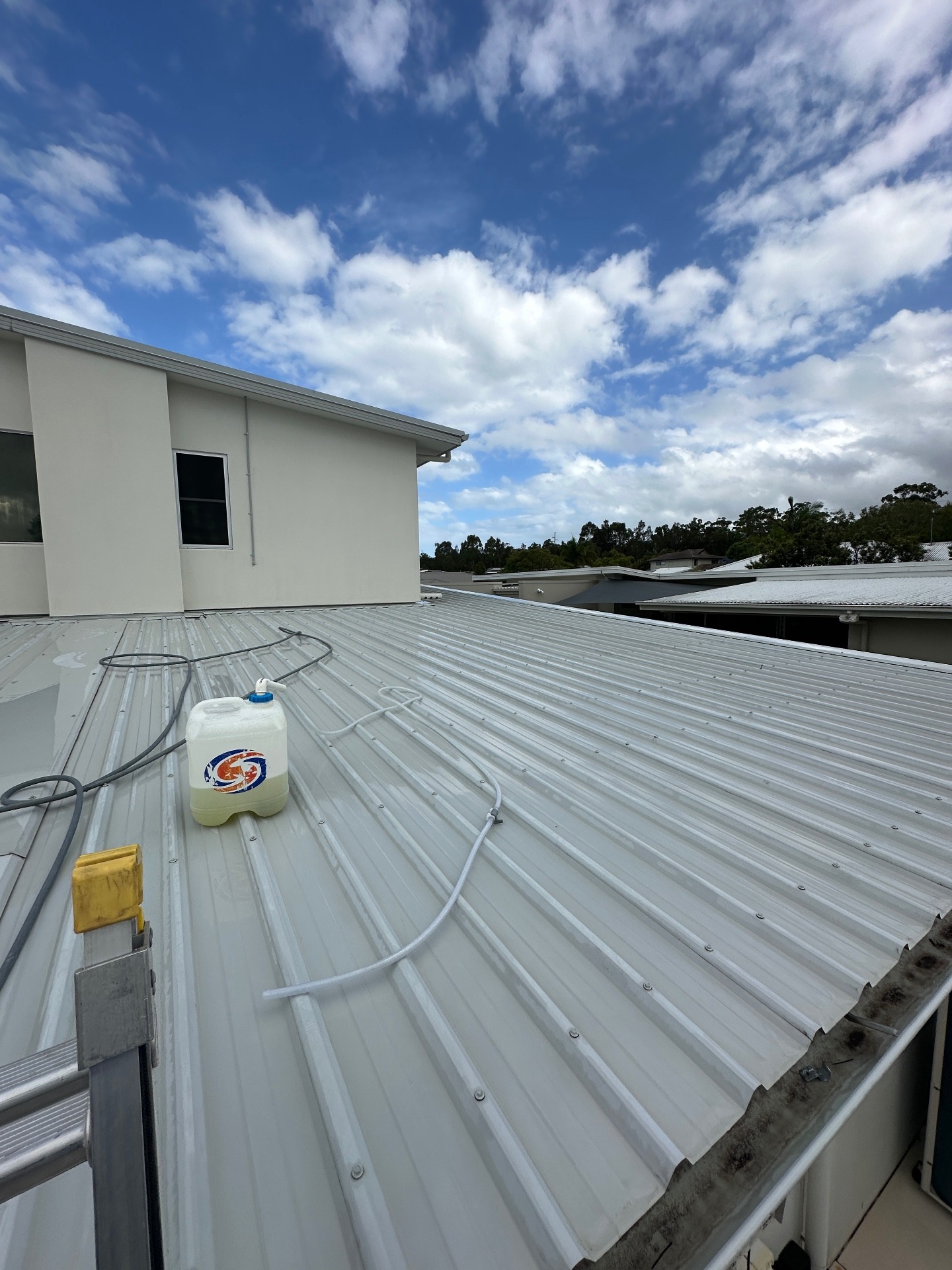 Colorbond roof soft-wash treatment — before and after by WETR Pressure Cleaning