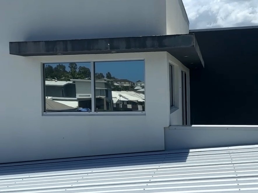 Warana render parapet soft-wash in Warana — after restoration
